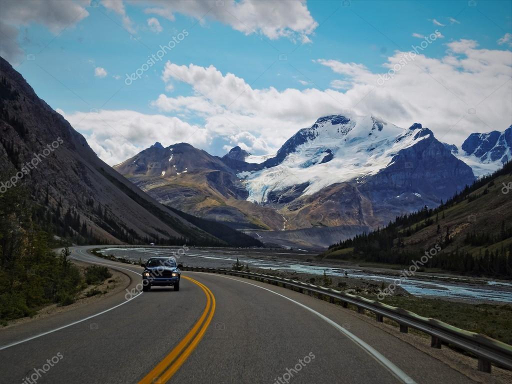 Road Trip Through The Snowy Rocky Mountains Stock Photo By C Jessharrison