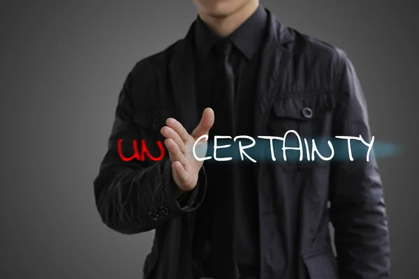 The concept of certainty. Businessman making certainty from uncertainty — Stock Photo, Image
