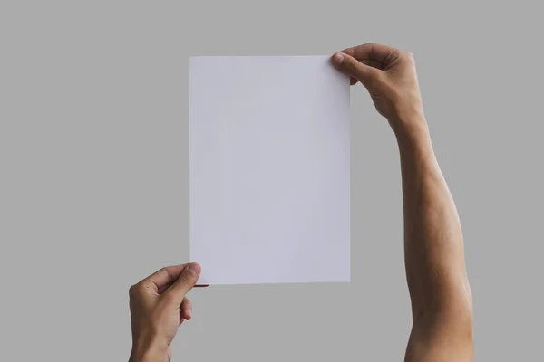 Man showing blank white big A2 paper. Leaflet presentation. Pamp