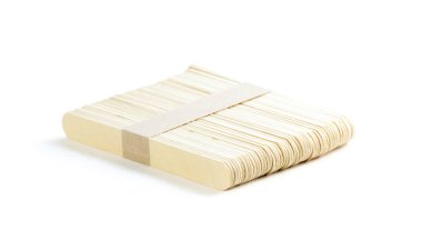 Wooden spatulas. Close up. Isolated on a white background.