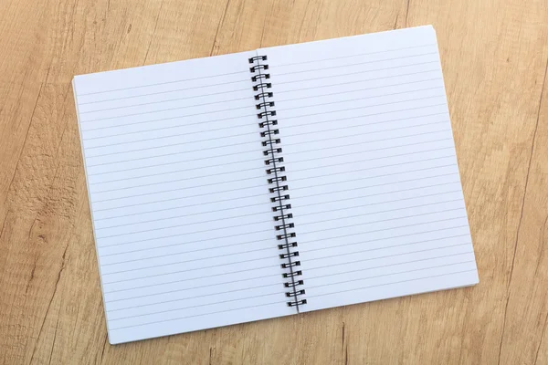 Notepad on a wooden surface — Stock Photo, Image