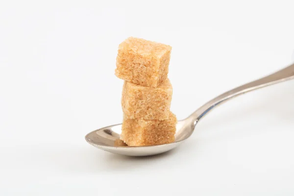 Gula batu dalam sendok — Stok Foto