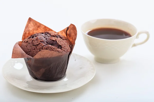 Cup of coffee and chocolate muffin — Stock Photo, Image