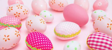 Easter eggs collection pink pastel color on pink background. Happy Easter greeting card, banner, Christian religion holiday celebration and decoration.