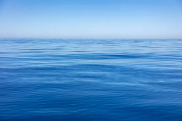 Seascape Calm Sea Surface Small Ripples Blue Sky Background Still — Stockfoto