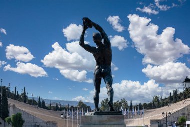 The bronze discobolus statue opposite ancient Panathinaiko stadium, Kallimarmaro Athens. Greece. Metallic diskovolos sculpture, sightseeing attraction clipart