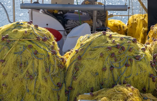 Fishing Nets Stacks Trawler Yellow Color Fishnets Ropes Floats Drying — Stock Photo, Image