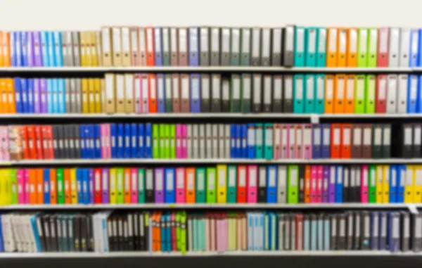 Blurred binders in Office Supply Store — Stock Photo, Image