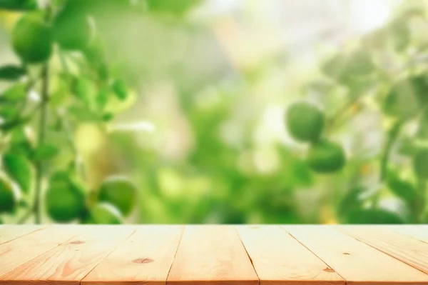 Empty Wood Table Free Space Limes Tree Garden Green Lemons — Stock Photo, Image