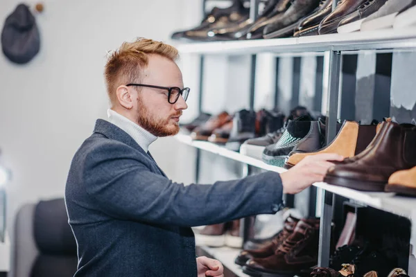 Fashionable Male Stylist Glasses Jacket Chooses Shoes Store — Stock Photo, Image