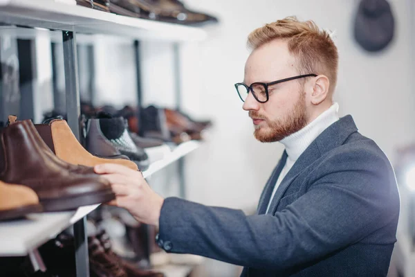 Fashionable Male Stylist Glasses Jacket Chooses Shoes Store — Stock Photo, Image