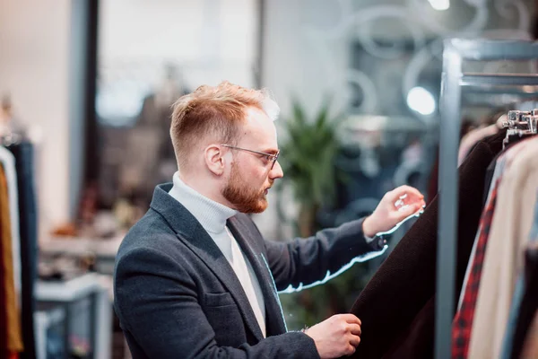 Blonde Millennial Man Business Attire Chooses Clothes Store Man Shopping — Stock Photo, Image