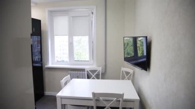 interior footage of stylish black and white kitchen 