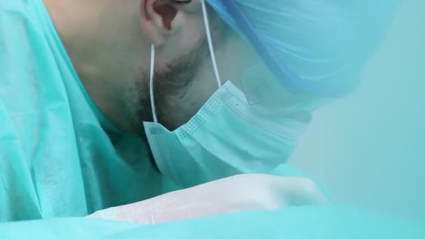 Male Surgeon Doctor Glasses Operating Patient Operating Room — Stock Video