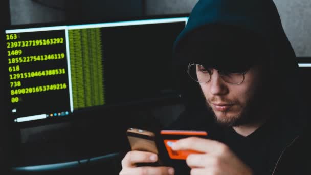 Male Cybercriminal Enters Data Plastic Payment Card Crimes Internet — Stock Video