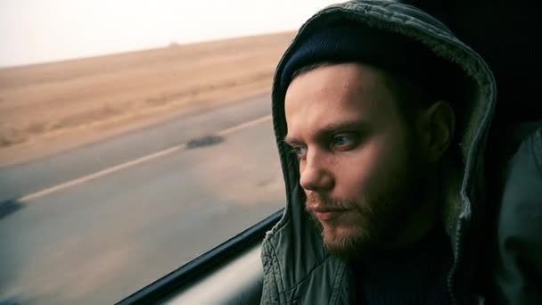 Sad Man Traveler Rides Car Looks Out Window Lonely — Video Stock