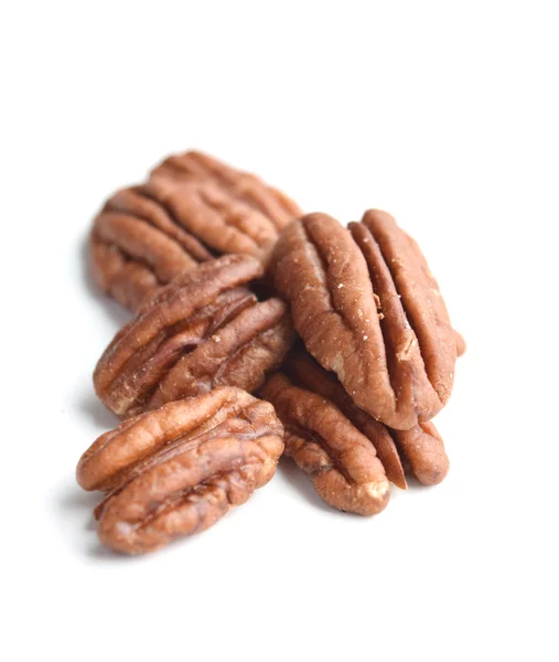 Pecans na białym tle — Zdjęcie stockowe