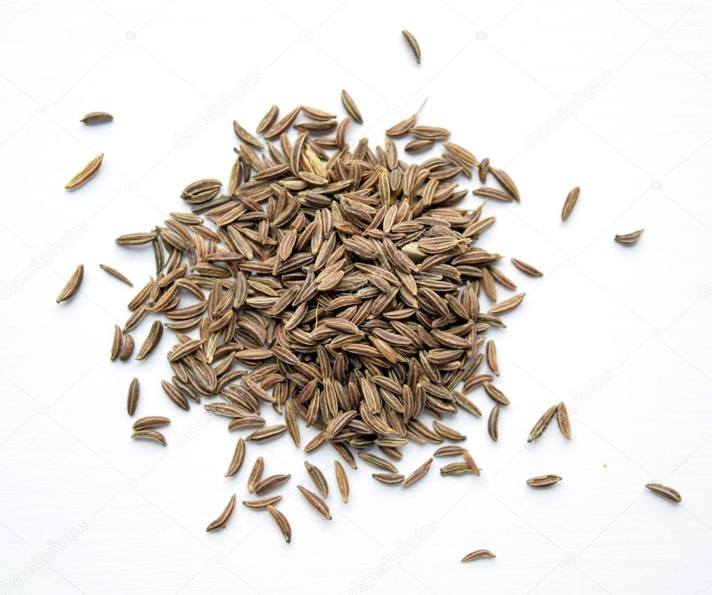 Pile of caraway seeds isolated