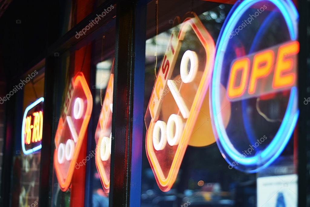 NEW YORK, NY - SEPTEMBER 9th, 2016: Window with neon lights of Domino's Pizza - location in Upper East Side, Manhattan