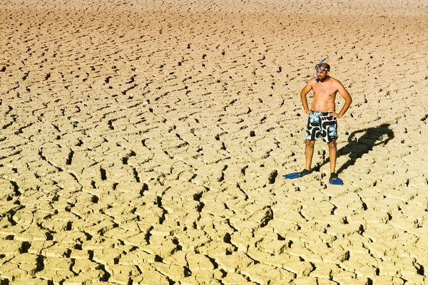 A young practicing diving in a dry swamp Stock Photo