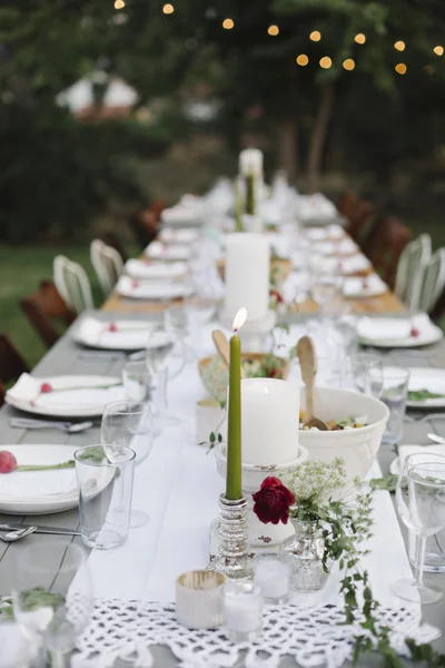 Table set with plates and glasses — Stock Photo, Image