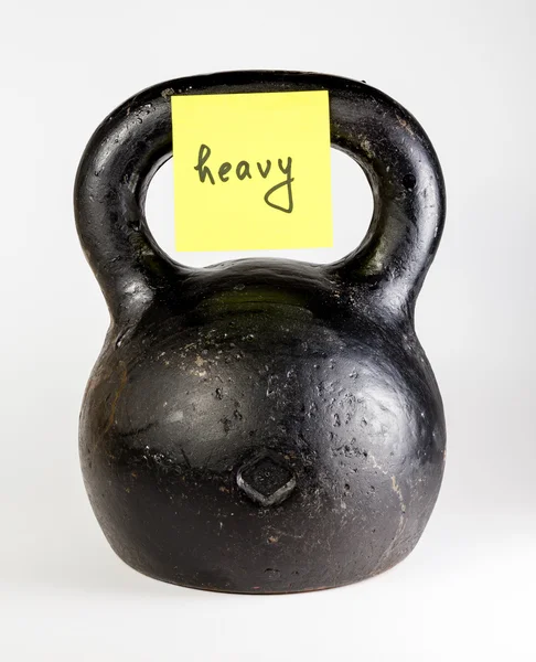 Černá kettlebell s těžkými popisku — Stock fotografie