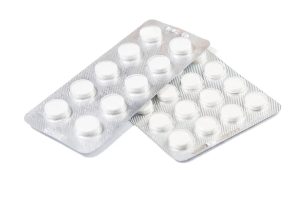 Två förpackningar av piller isolerad på vit bakgrund — Stockfoto