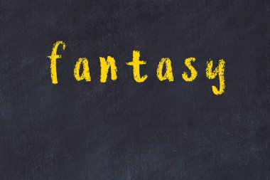 Üzerinde yazı fantazisi olan siyah karatahta.