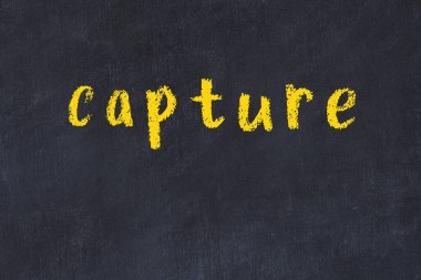 Üzerinde yazı olan siyah karatahta