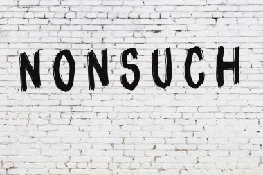 Üzerinde siyah boya olan beyaz bir duvar.