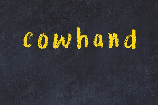 Chalkboard preto com cowhand inscrição em — Fotografia de Stock