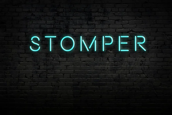 Neon sign. Word stomper against brick wall. Night view — Stock Photo, Image
