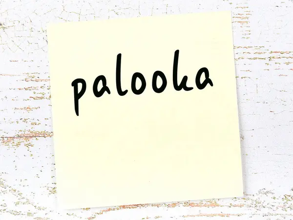 単語palokaと紙の黄色のシート.リマインダーのコンセプト — ストック写真