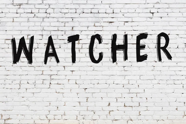 Weiße Wand mit schwarzer Farbe Aufschrift Watcher darauf — Stockfoto