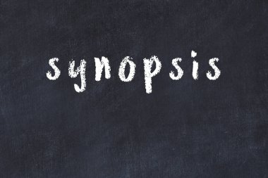 Siyah masaya elle yazılmış tebeşir yazı özeti