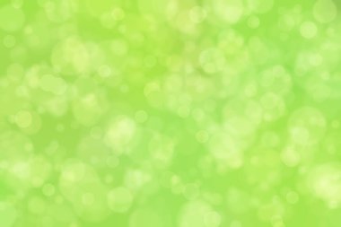 Çember şekilli bokeh benekli yeşil soyut odaklanmış arkaplan