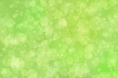 Altıgen şekilli bokeh benekli yeşil soyut odaklanmış arkaplan