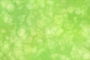Altıgen şekilli bokeh benekli yeşil soyut odaklanmış arkaplan