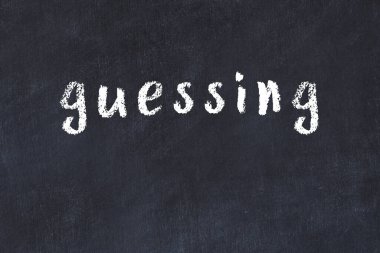 Üzerinde el yazısı tahmini olan üniversite yazı tahtası.