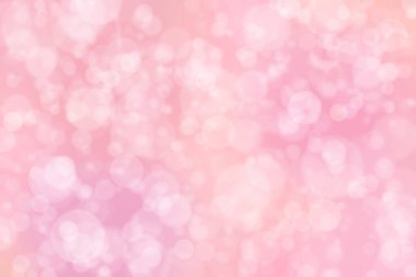 Çember şeklindeki bokeh benekleri ile odaklanmış pembe soyut arkaplan