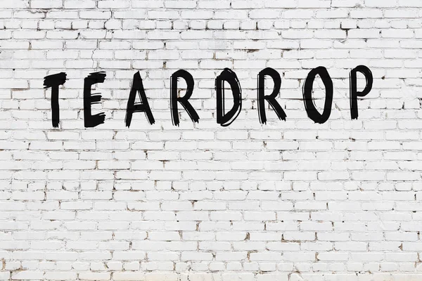 Inscription Teardrop Written Black Paint White Brick Wall — Stock Photo, Image