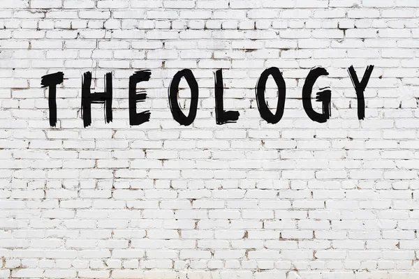 Надпись Теология Написана Черной Краской Белой Кирпичной Стене — стоковое фото