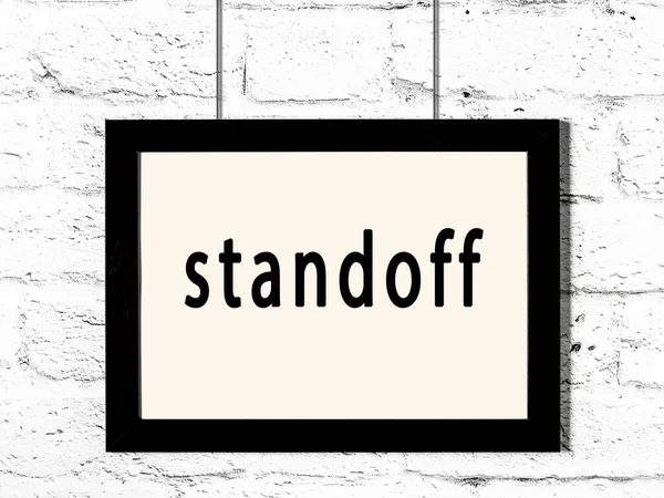 Black Wooden Frame Inscription Standoff Hanging White Brick Wall — Stock Photo, Image