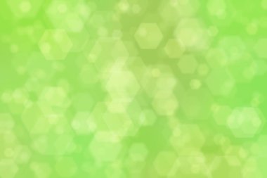 Altıgen şekilli bokeh benekli yeşil soyut odaklanmış arkaplan