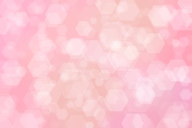 Altıgen şekilli bokeh noktalı pembe soyut odaklanmış arkaplan