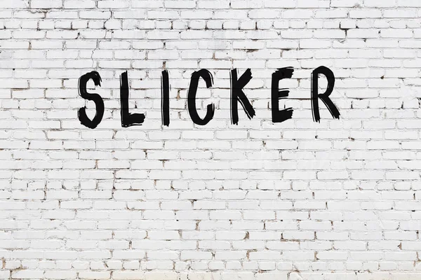 Inscription Slicker Written Black Paint White Brick Wall — Stock Photo, Image