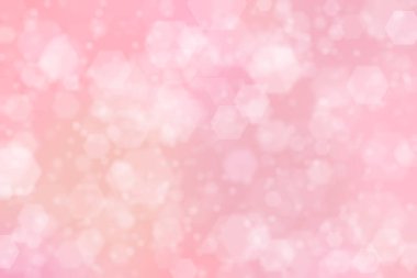 Altıgen şekilli bokeh noktalı pembe soyut odaklanmış arkaplan