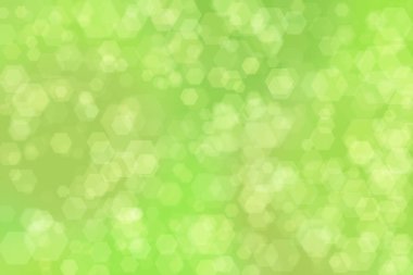 Altıgen şekilli bokeh benekli yeşil soyut odaklanmış arkaplan