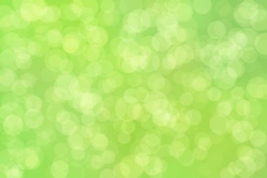 Çember şekilli bokeh benekli yeşil soyut odaklanmış arkaplan