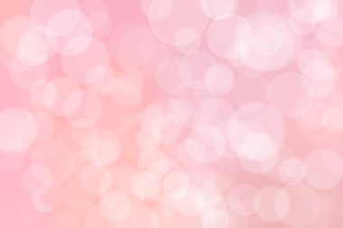Çember şeklindeki bokeh benekleri ile odaklanmış pembe soyut arkaplan